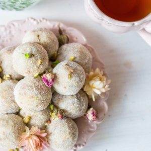 Homemade coconut balls decorated with little pink flowers